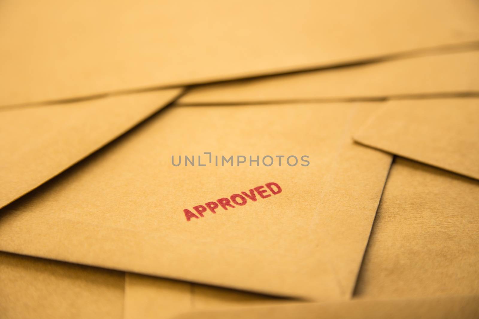 red approved sign on envelope, recruitment and human resources