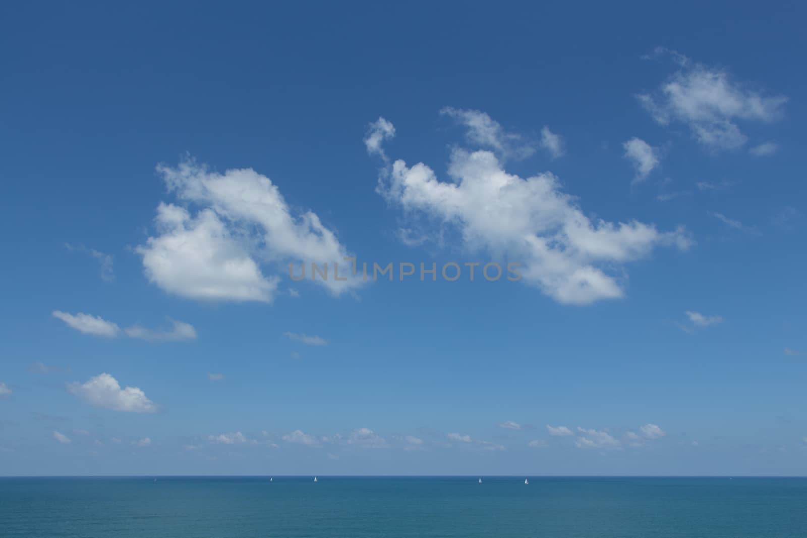 The blue sea under a beautiful blue sky.