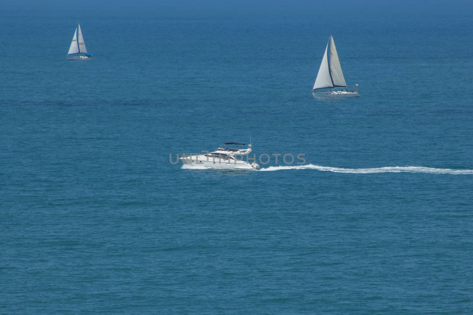 White yacht in the blue sea. Summer.