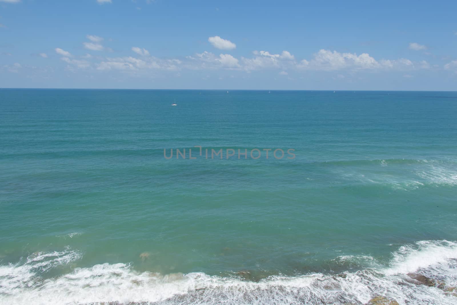 The blue sea under a beautiful blue sky.