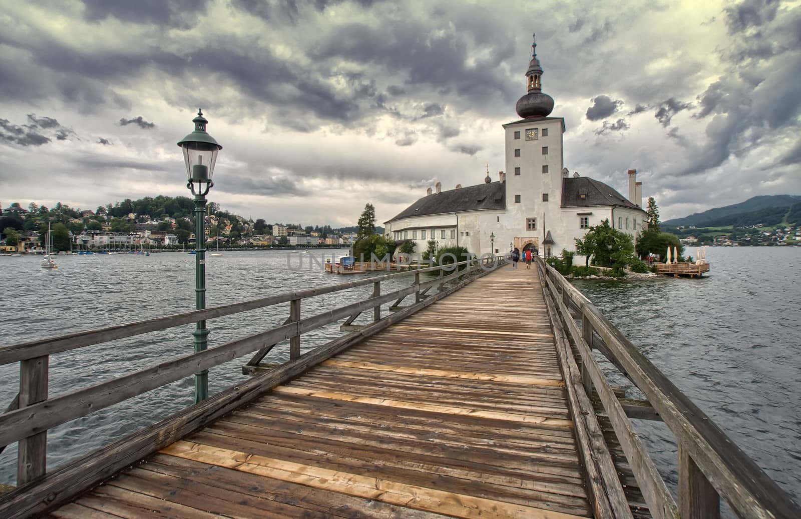 Austria : panorama of the lake and the bridge going to the church