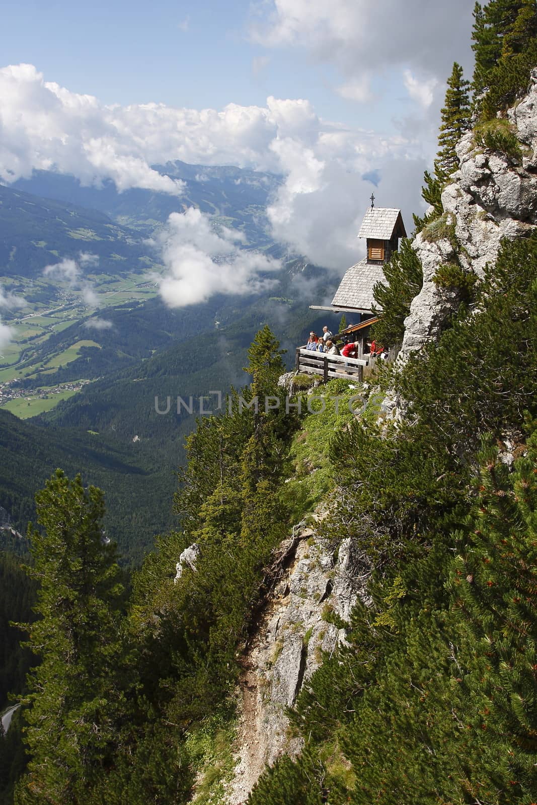 Austria little house on the rocky hill in the mountains