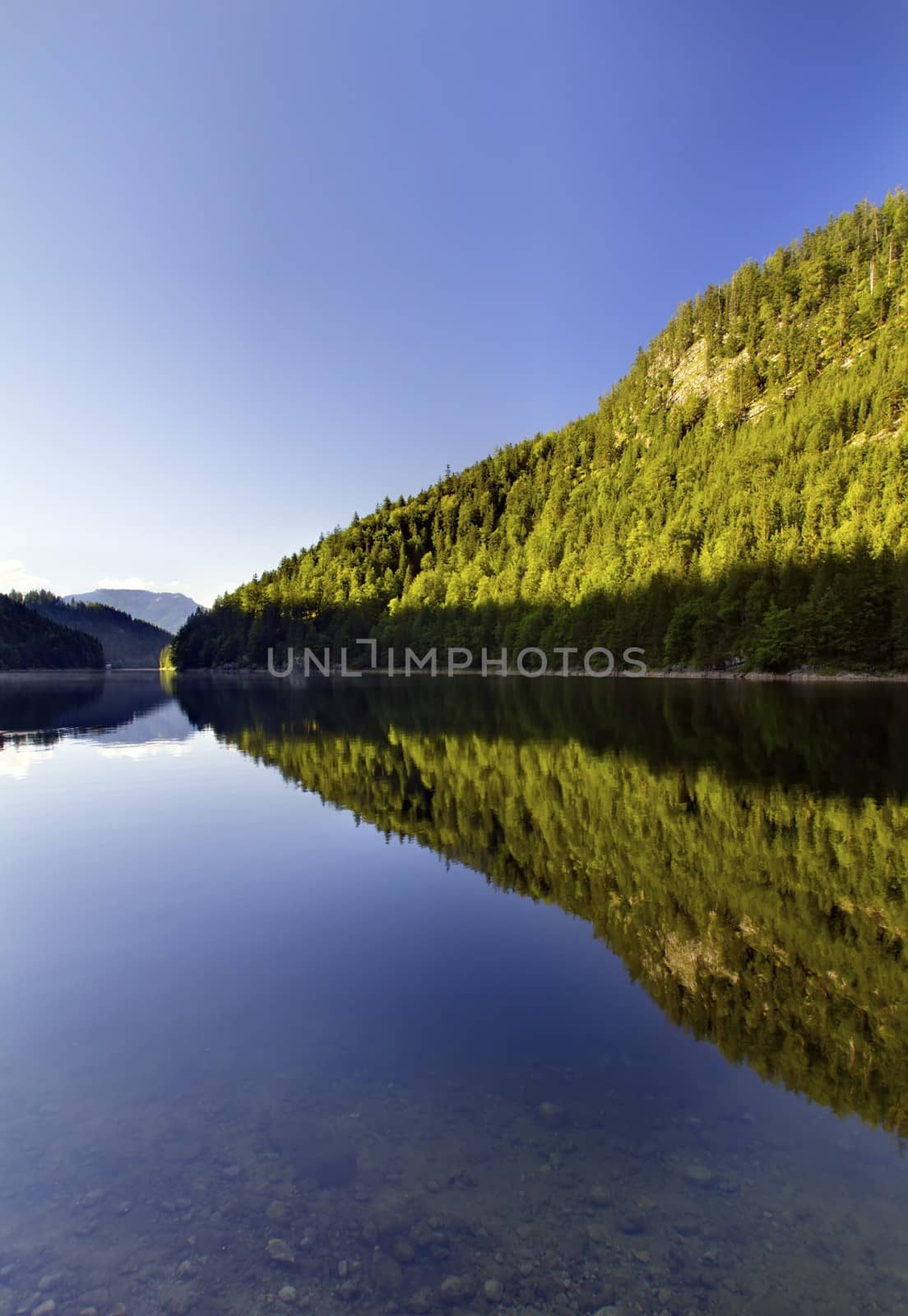 Beautiful lake with transparent cristal water in summer