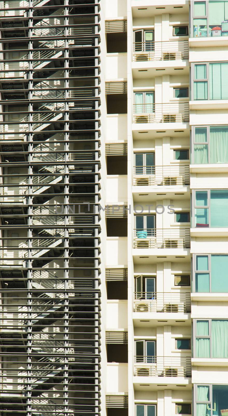 high rise apartments with sky background