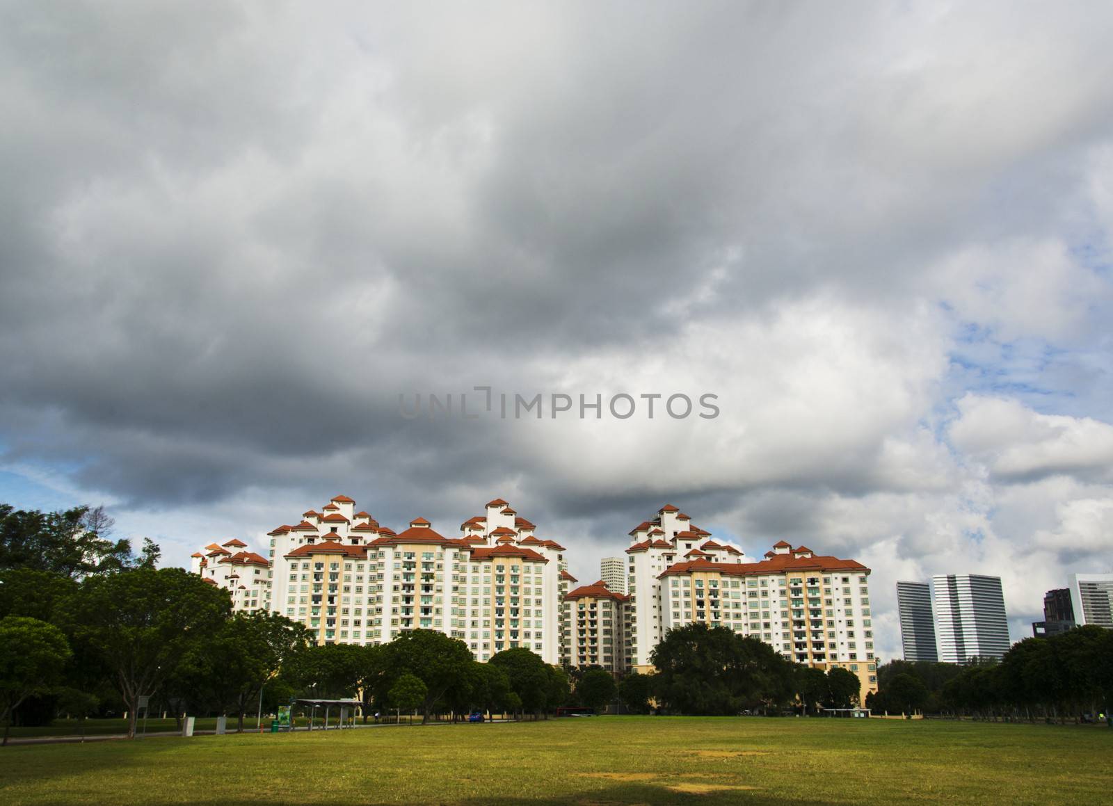 high rise apartments with sky background