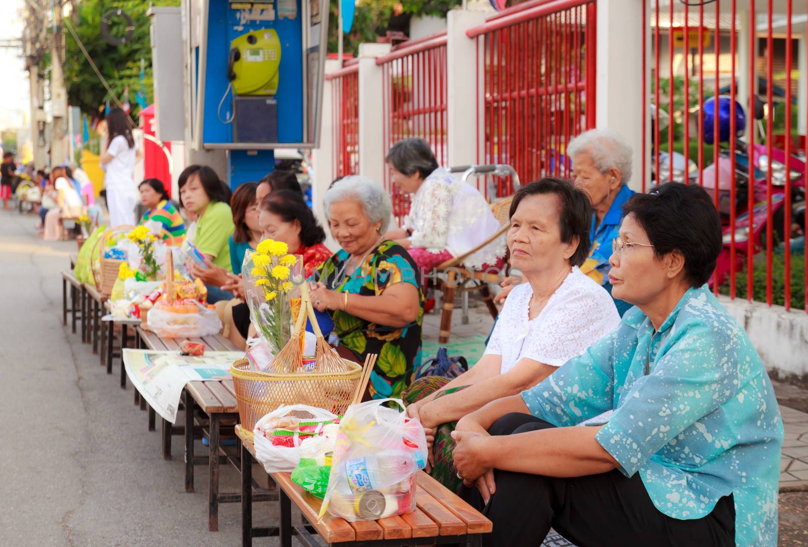 Phrae,Thailand - October 31,2012 : Unidentified Buddhist monks is given food offering from people at the morning on End of Buddhist Lent Day. on october 31, 2011 in Muang, Phrae, Thailand.