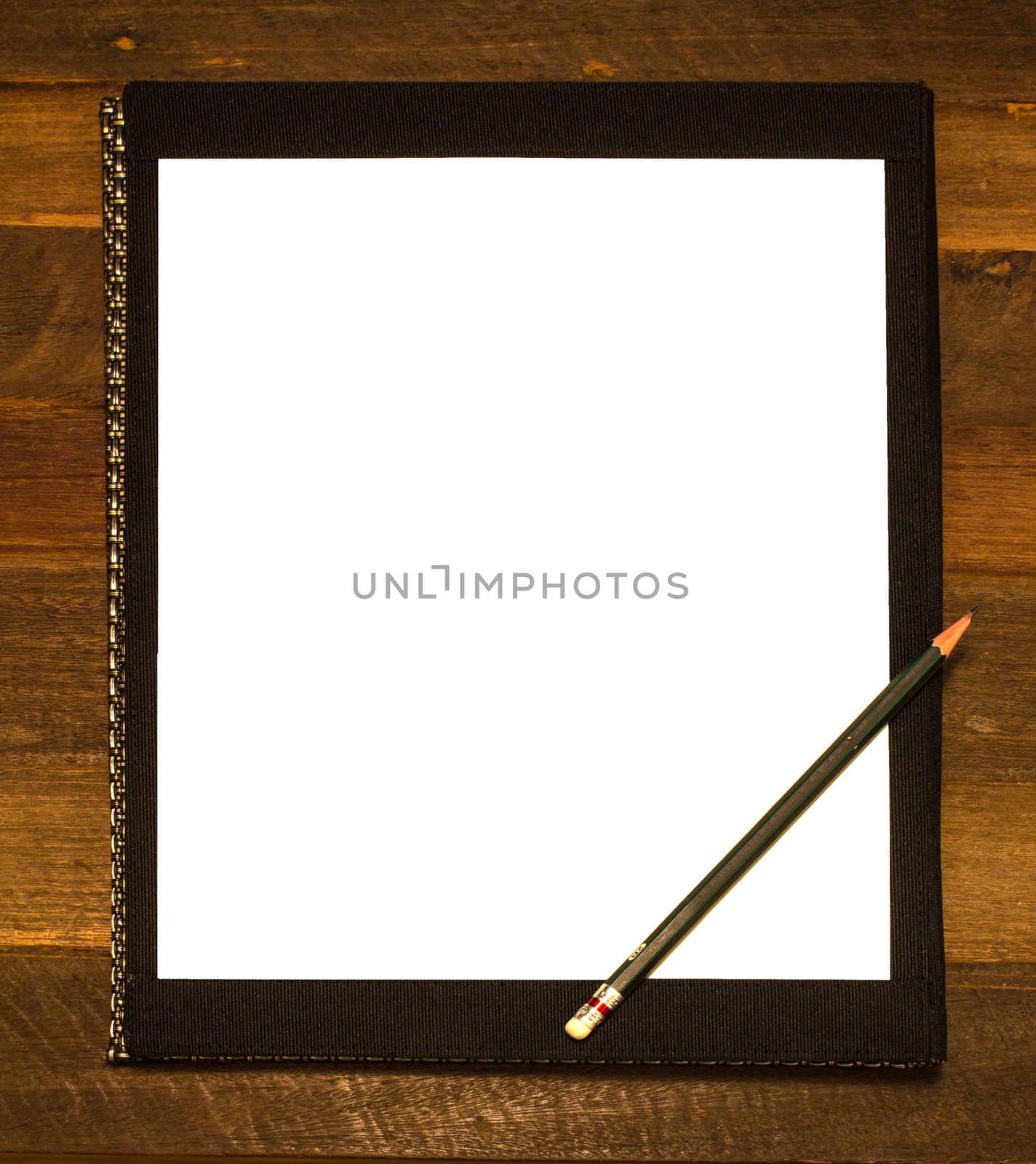 blank notepad and pencil on wooden background