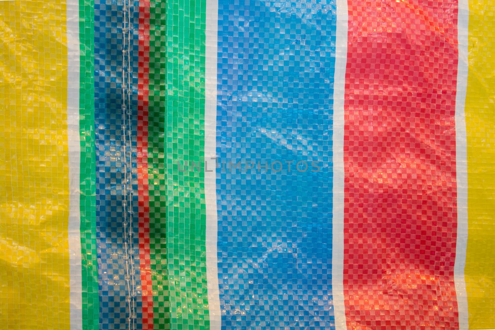 Vertical pattern front of Colorful From Plastic bag. For texture background