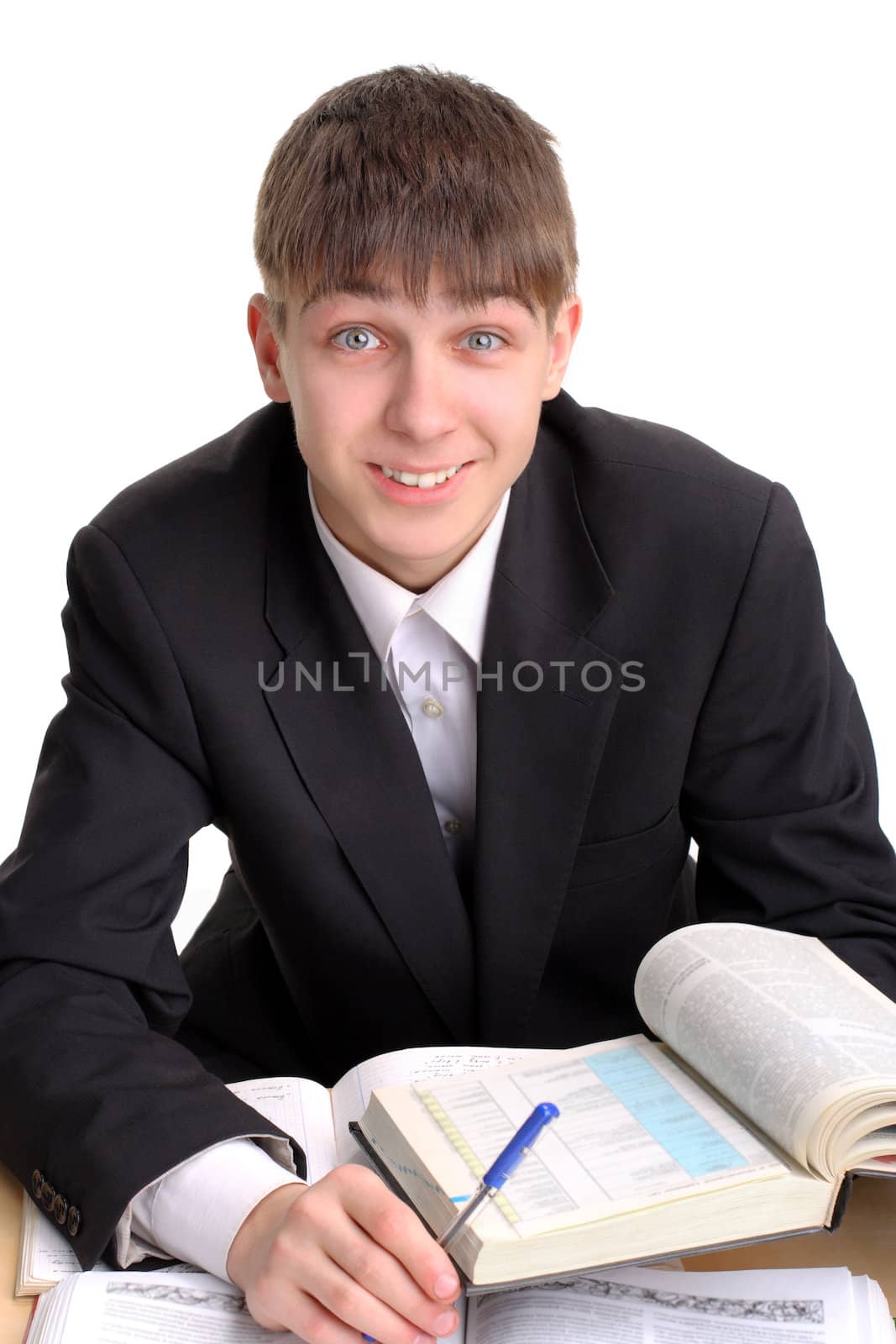 smiling student sitting with the books