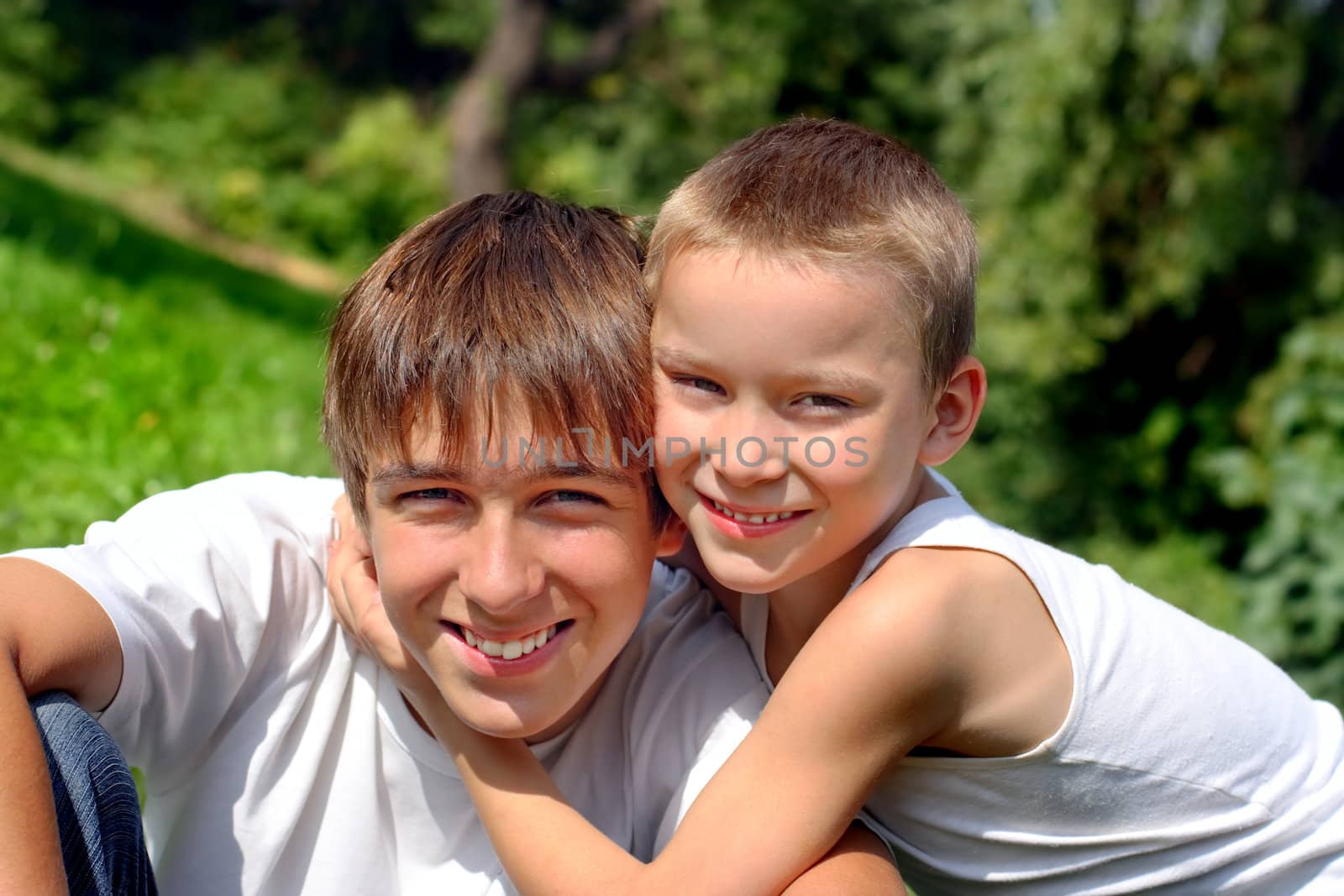 happy teenager and kid portrait outdoor