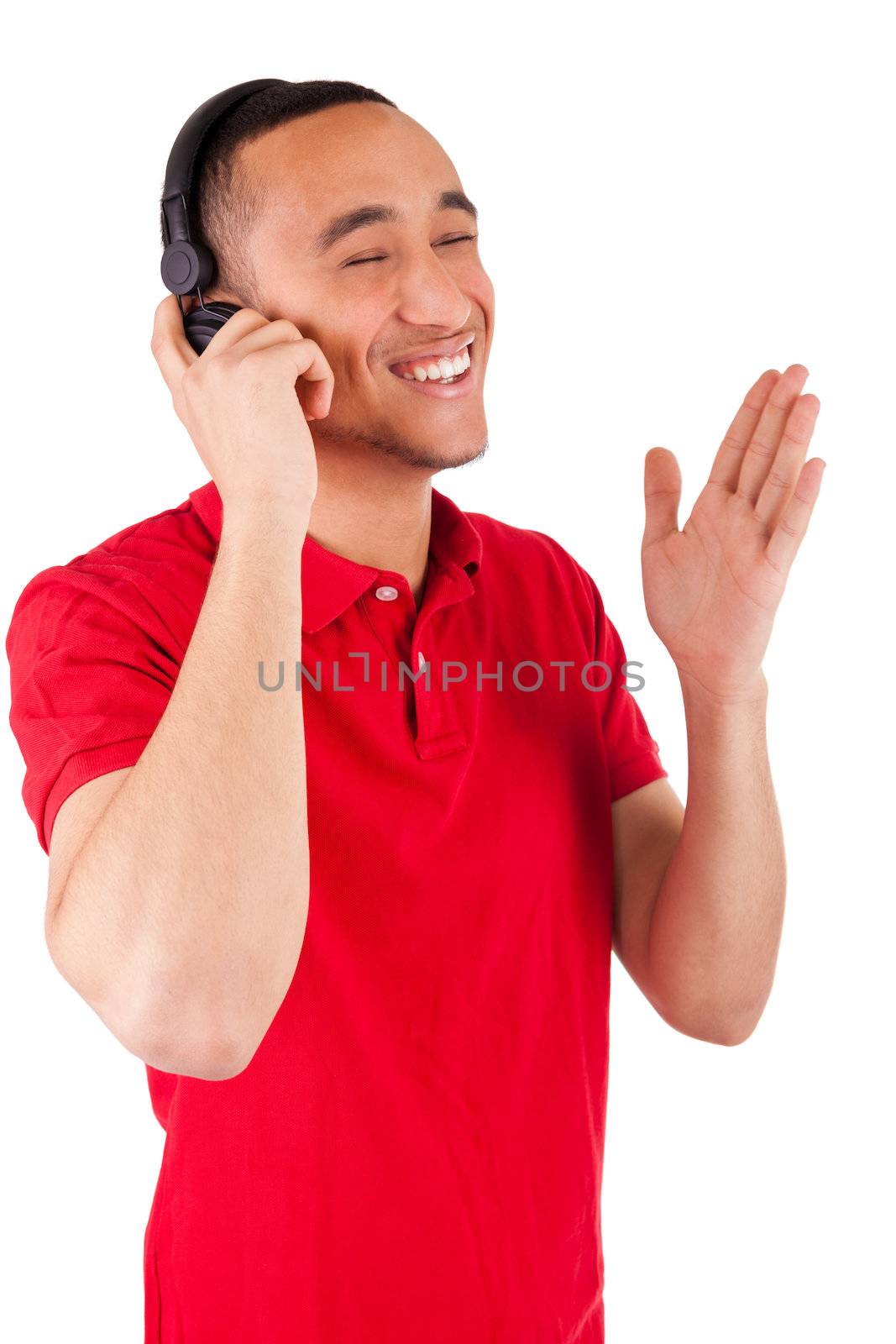 Black man having fun listening to music - isolated over a white background