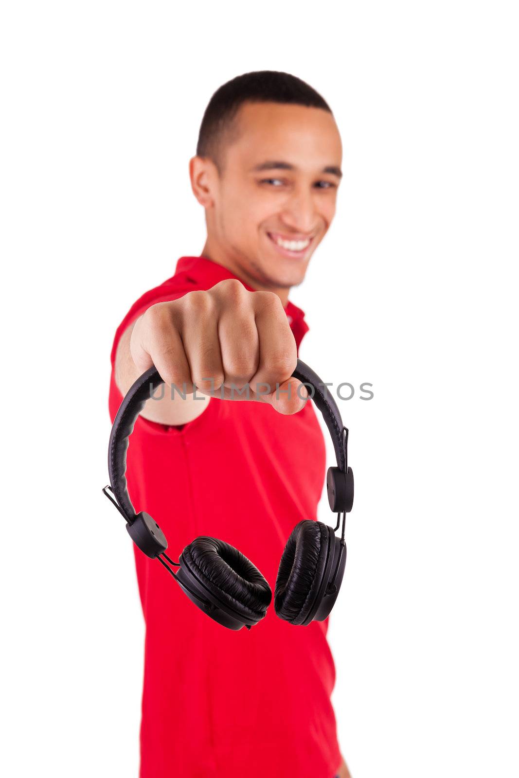 Black man having fun listening to music - isolated over a white background