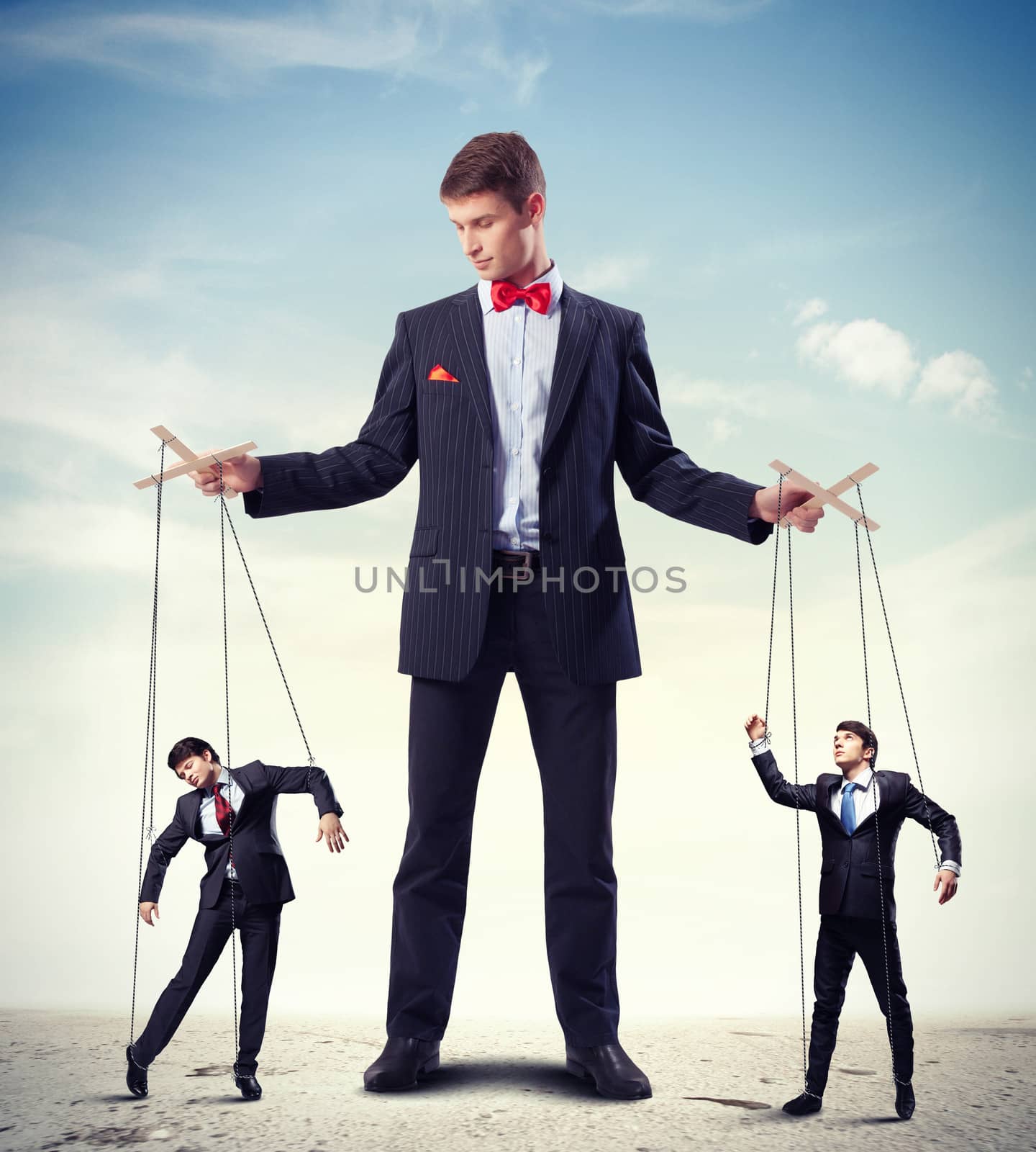 Businessman puppeteer by sergey_nivens