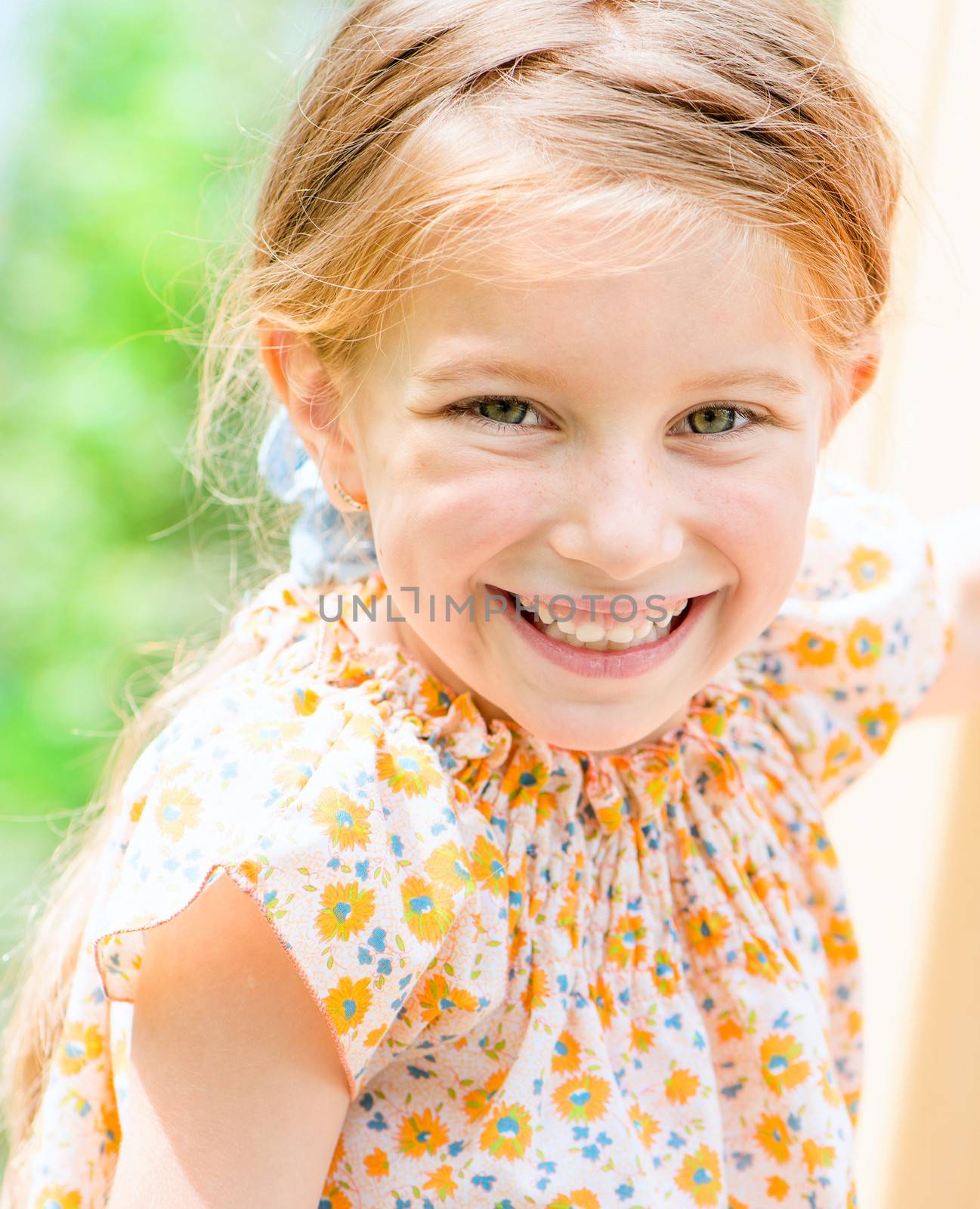 portrait of a cute smiling little girl