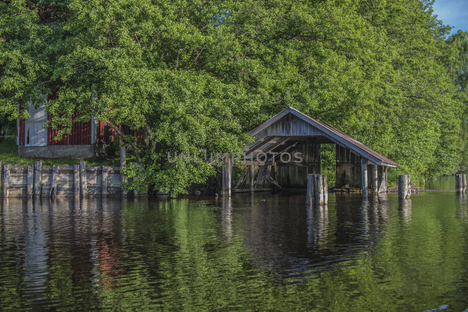 a beautiful day in a boat at five sea, old boathouse by steirus