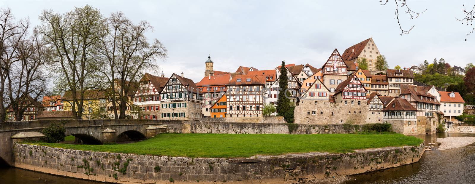 Panoramic view of the old town of Schwabisch Hall inside city walls and with the RIver Kocher running alongside the buildings.