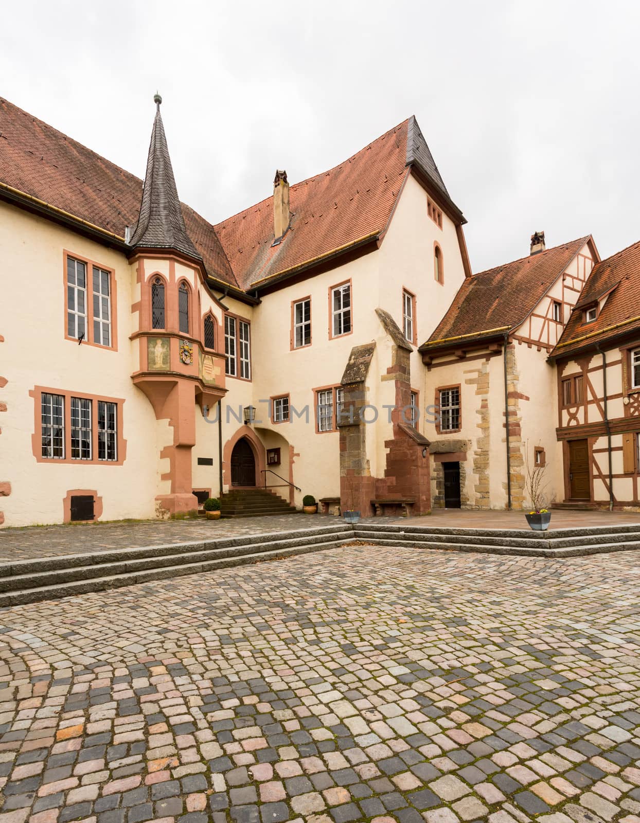 Kurmainz Castle with Turmersturm tower and Tauber Franconian Museum of Rural life in ancient town of Tauberbischofsheim in Germany