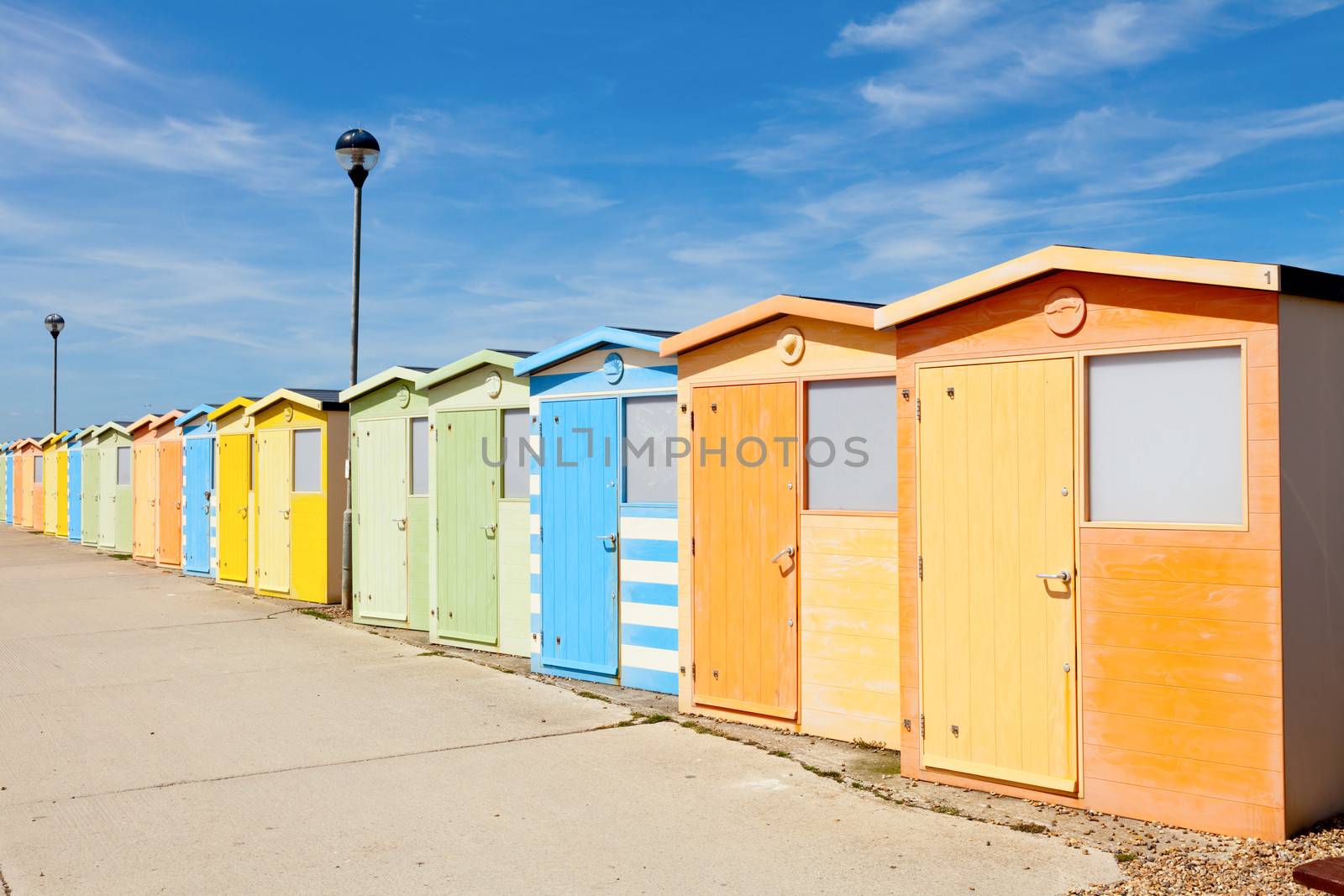 Colourful beach cabins in England