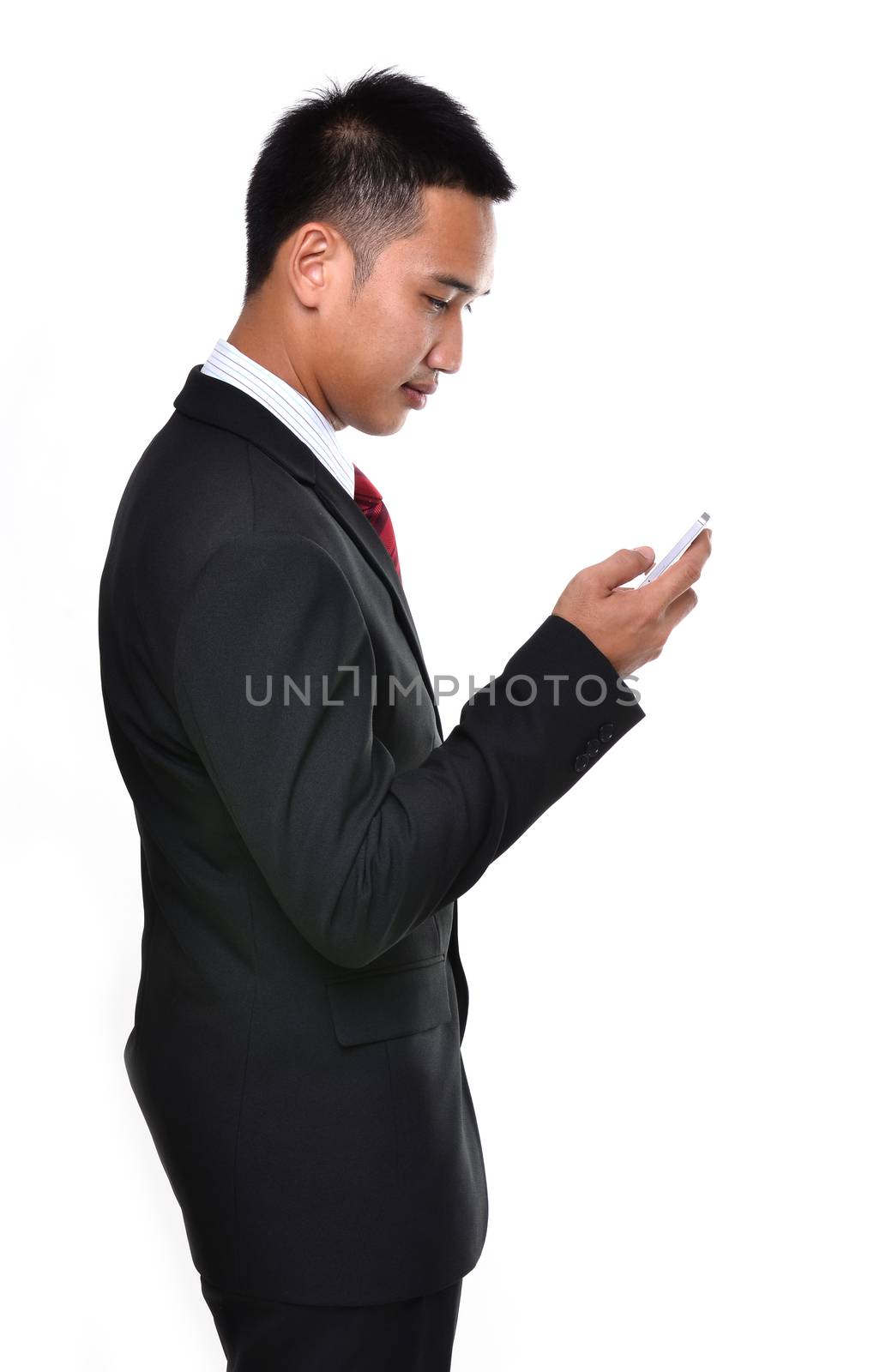 business man use mobile phone isolated on white background