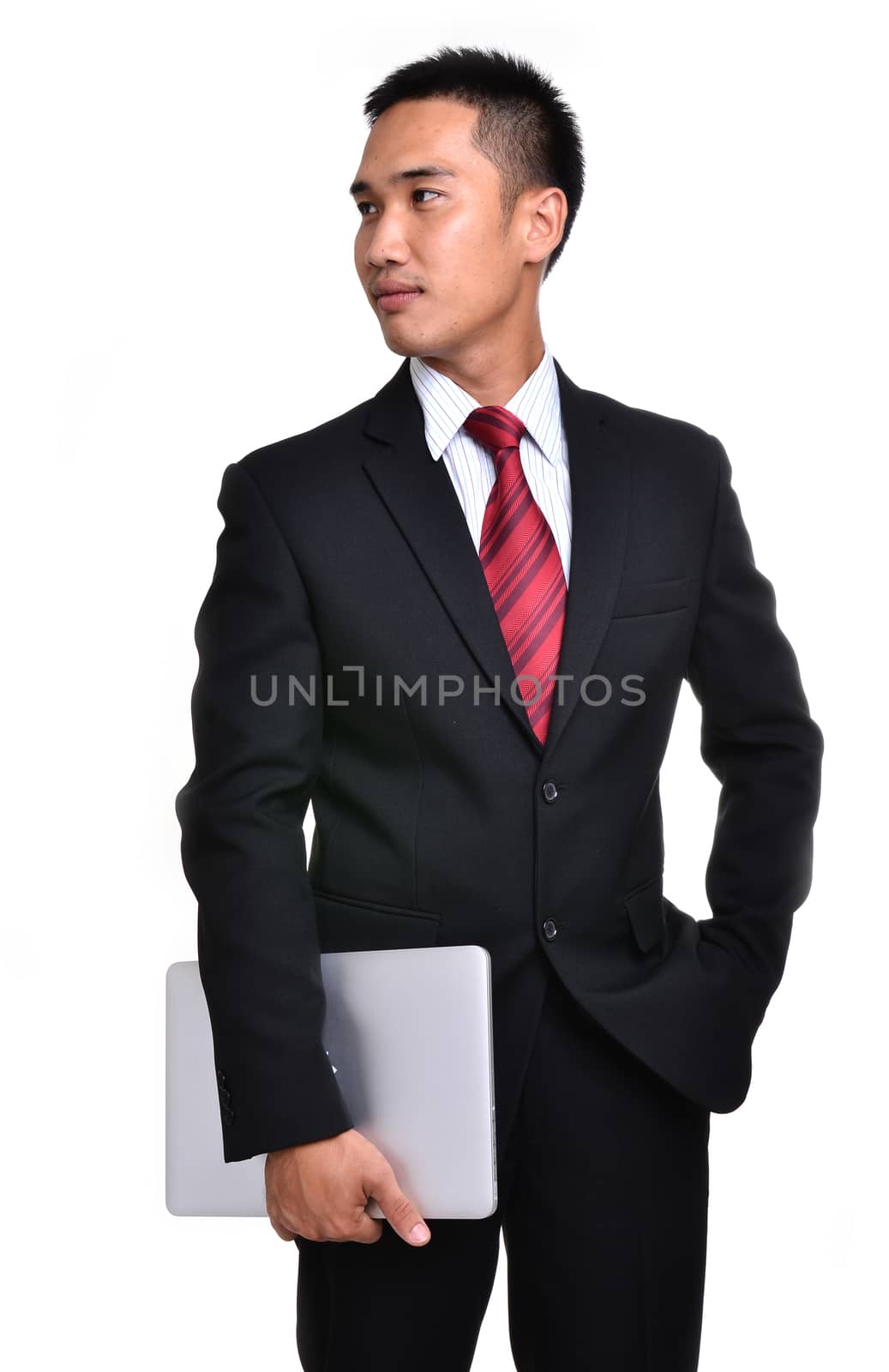 business man with laptop isolated  by anankkml