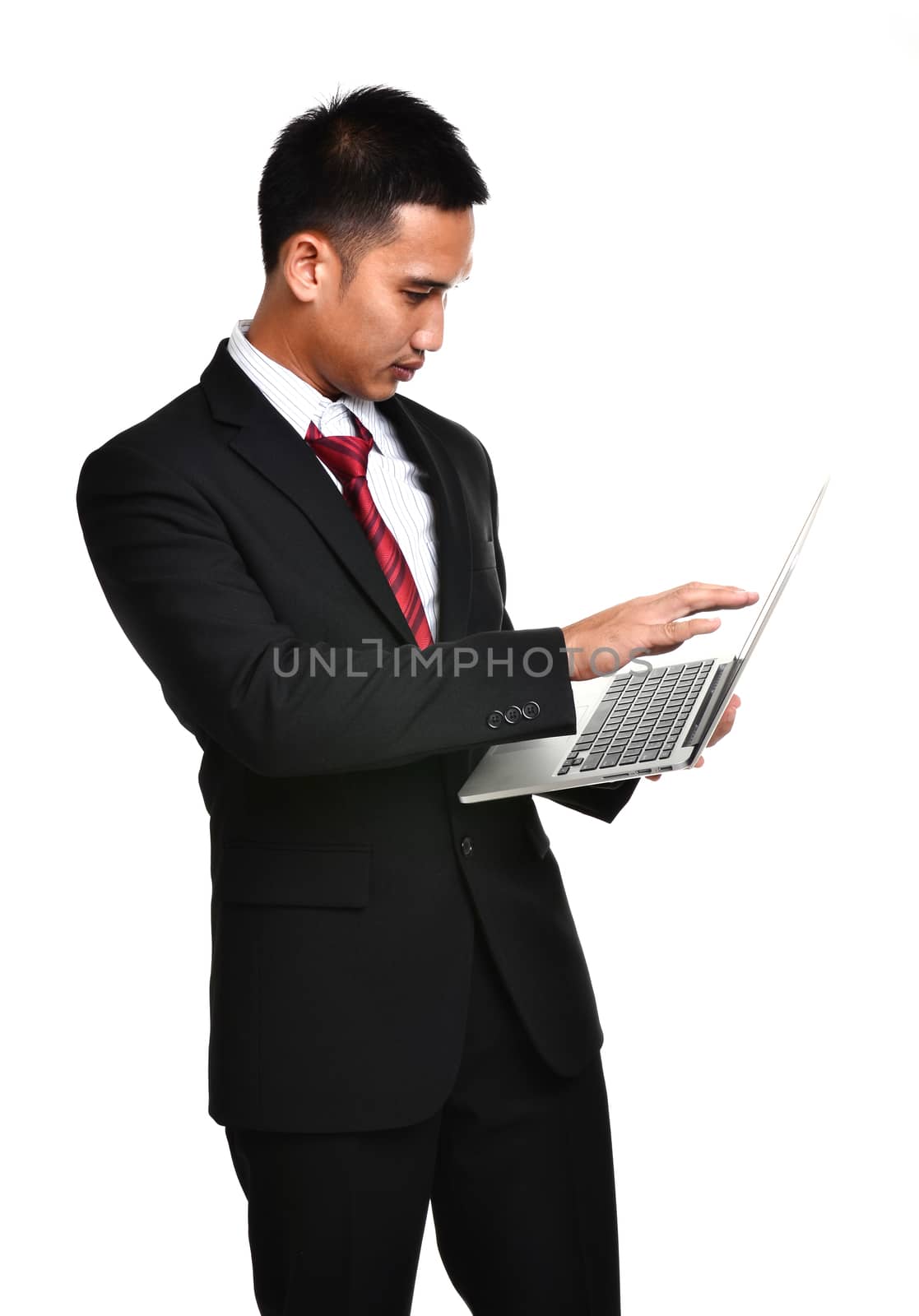 business man with laptop isolated on white background