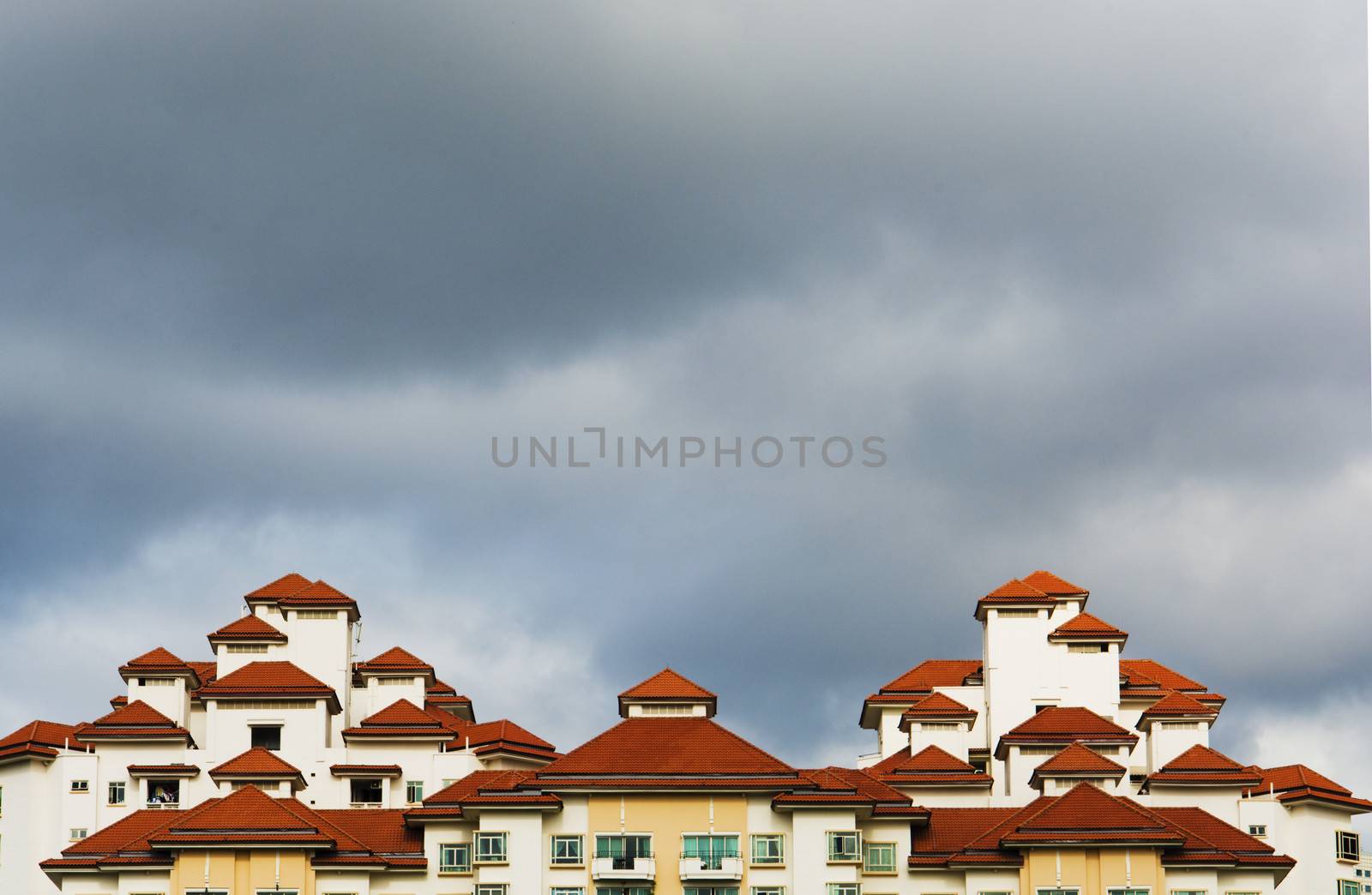 high rise apartments with sky background