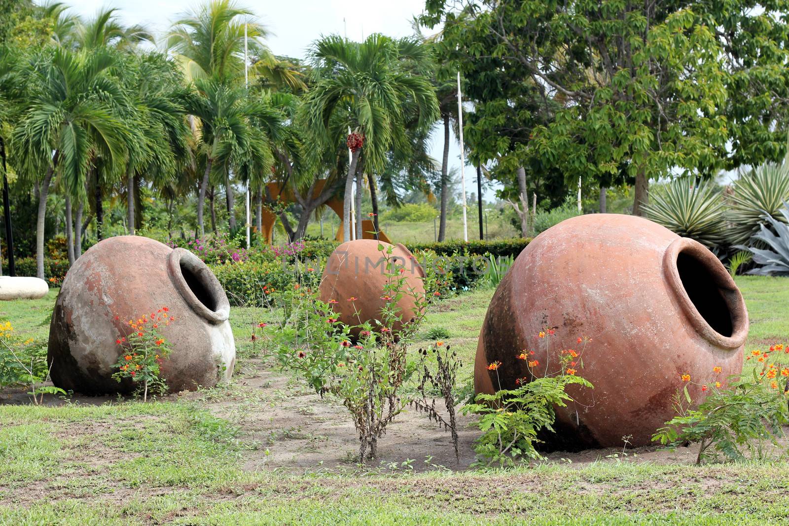 Three traditional clay pots (Tinajon), used for collecting rainwater, in Santa Lucia, Cuba