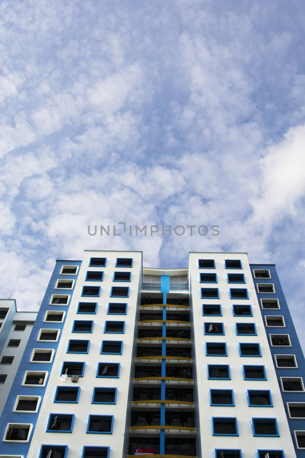 high rise apartments with sky background