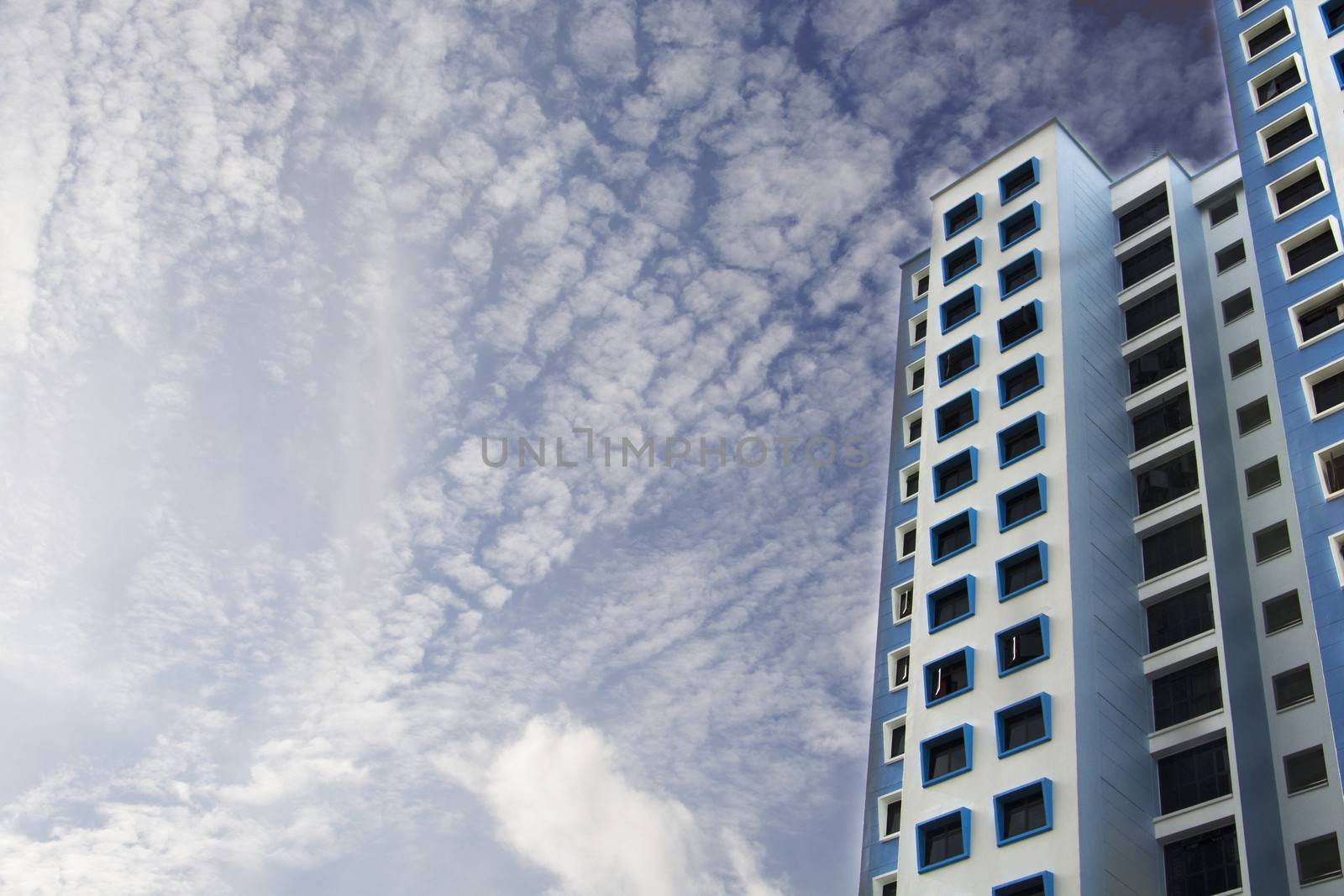 high rise apartments with clear blue sky