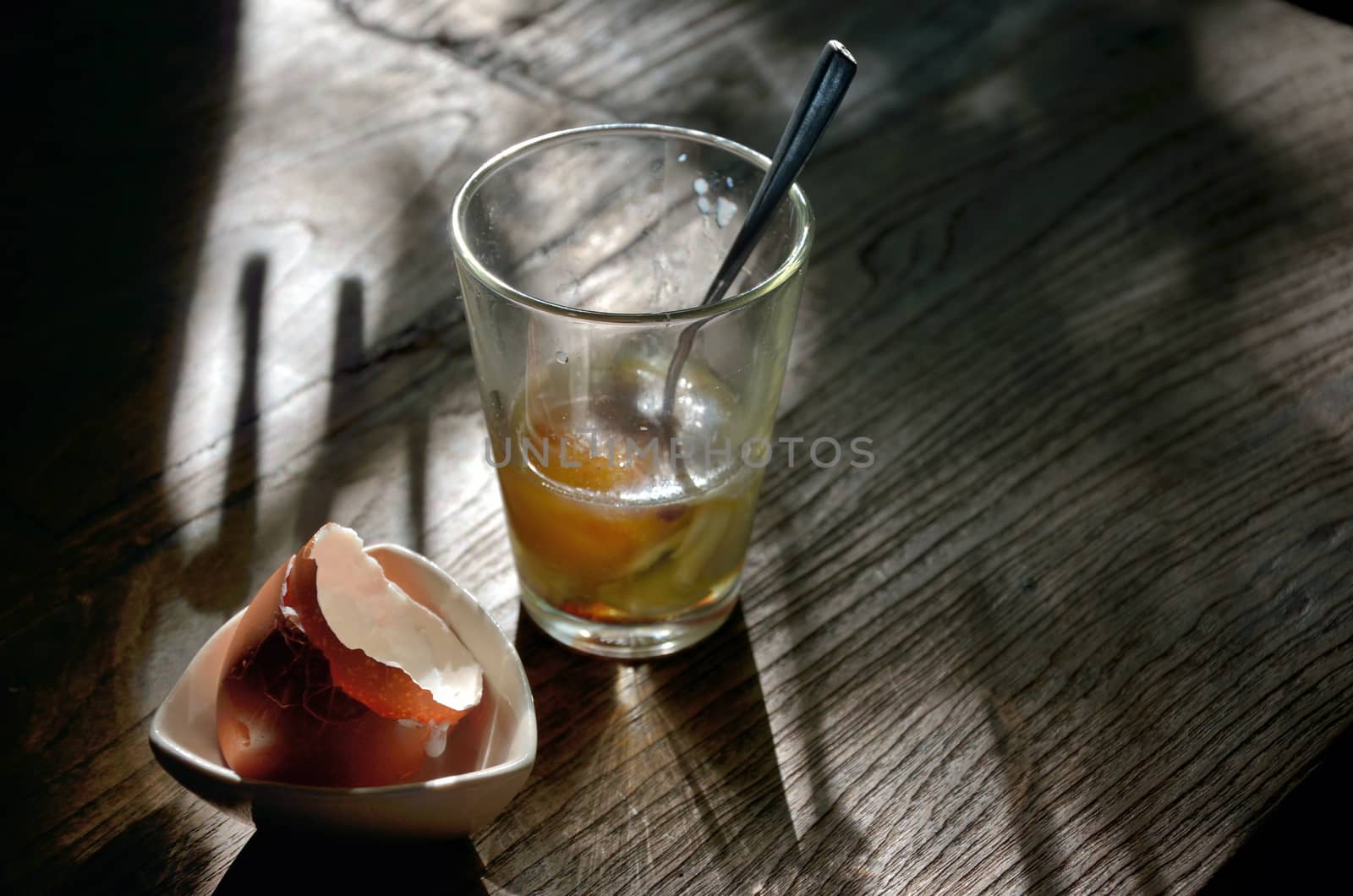 Soft-boiled egg in clear glass with morning light 