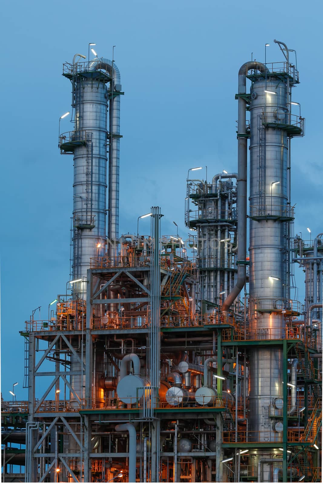 Chemical plant structure with lighting reflection