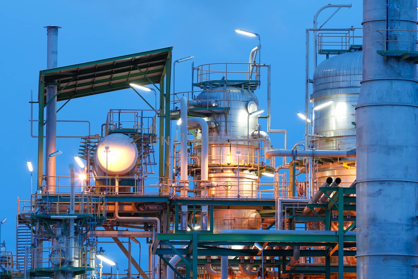 Chemical plant structure with lighting reflection