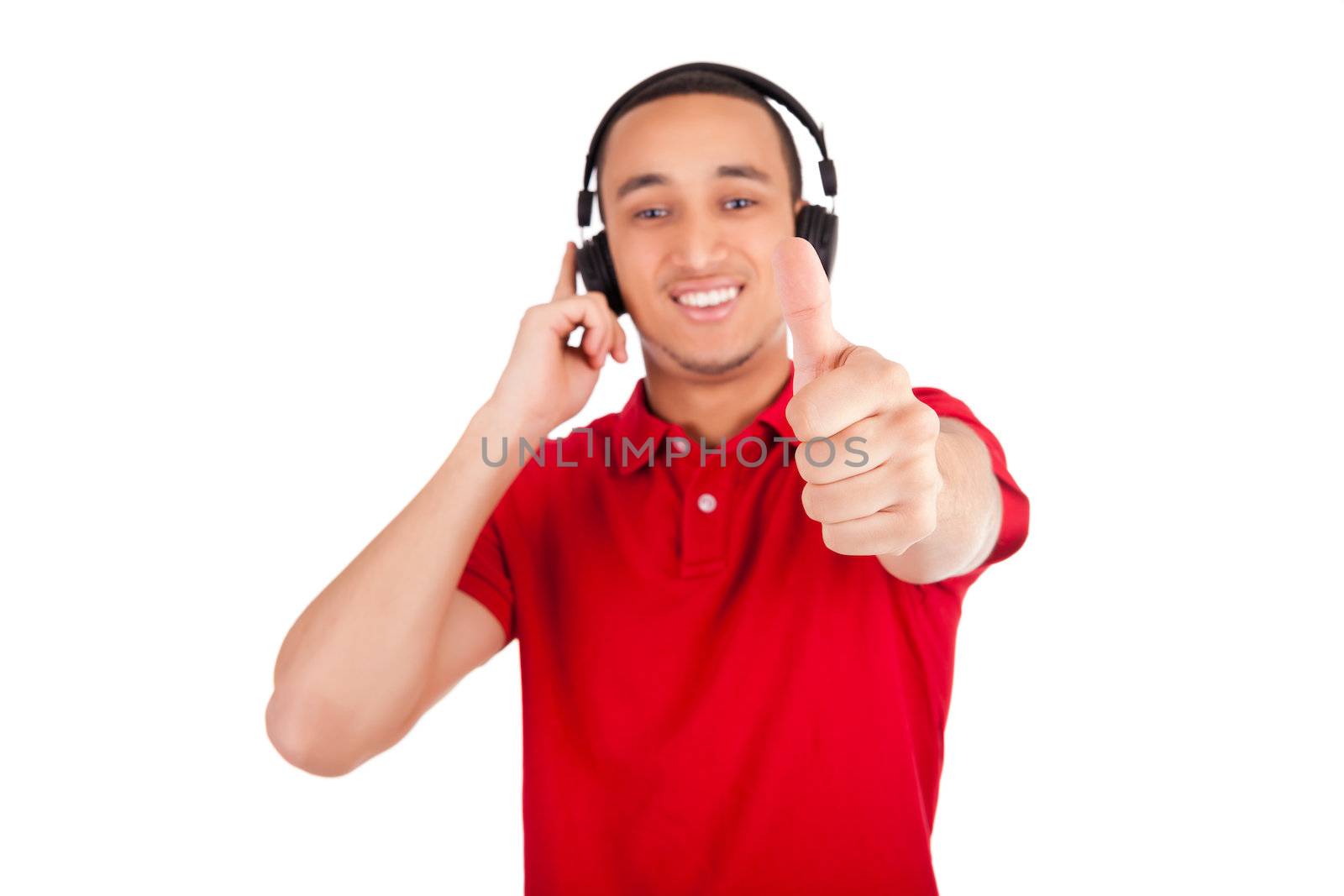 Black man having fun listening to music - isolated over a white background