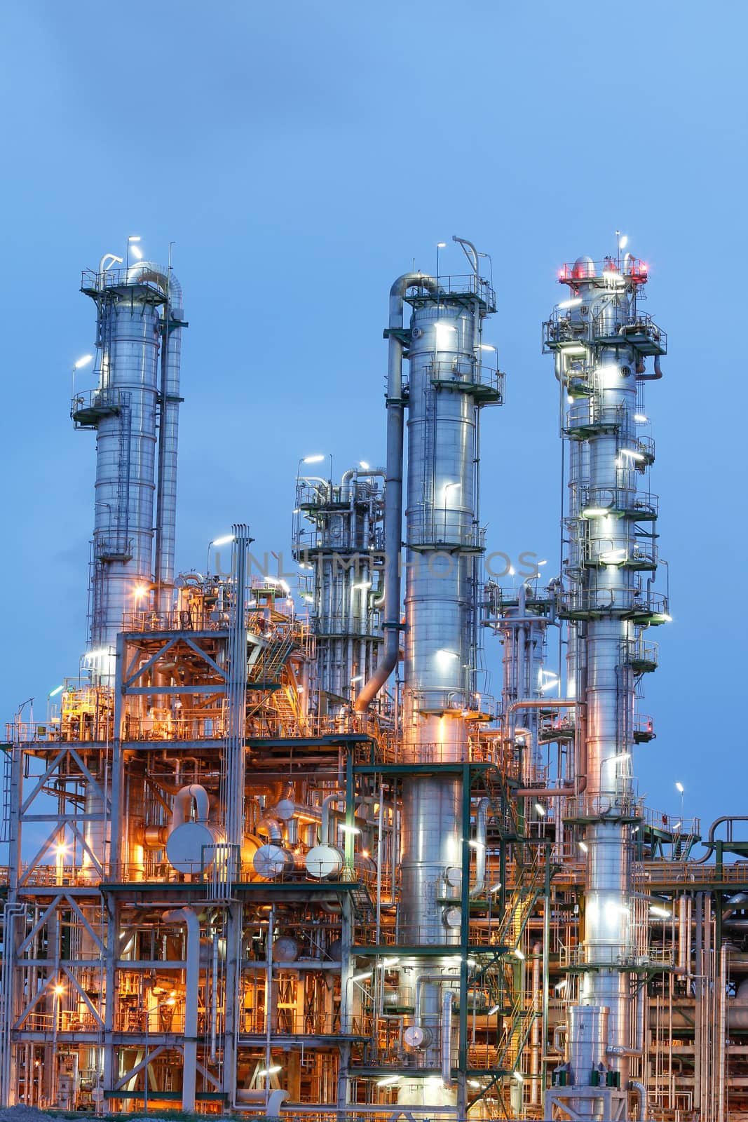 Chemical plant structure with lighting reflection