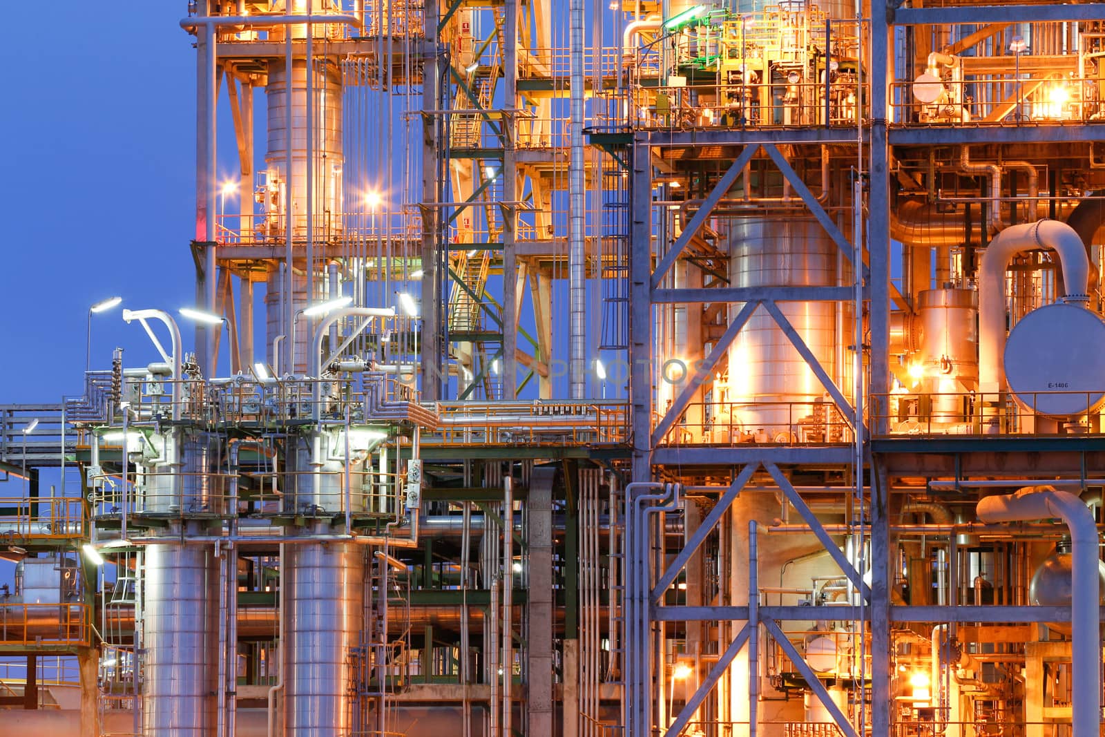 Chemical plant structure with lighting reflection