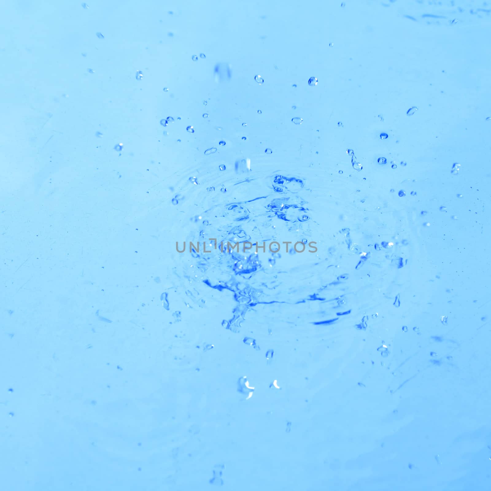 blue water splash macro close up