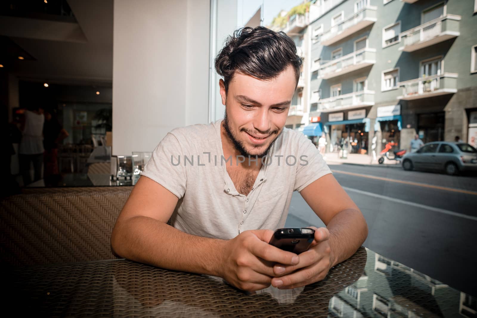 young stylish man in a bar
