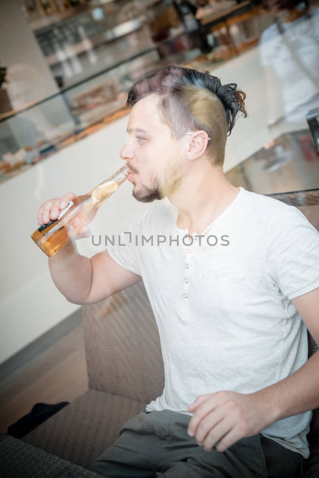 young stylish man in a bar
