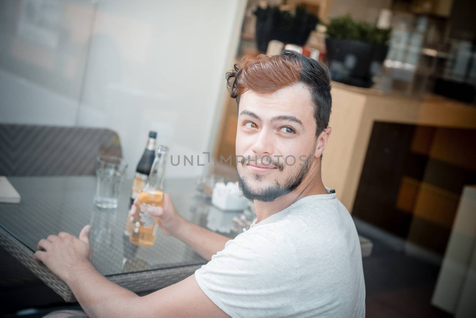 young stylish man in a bar