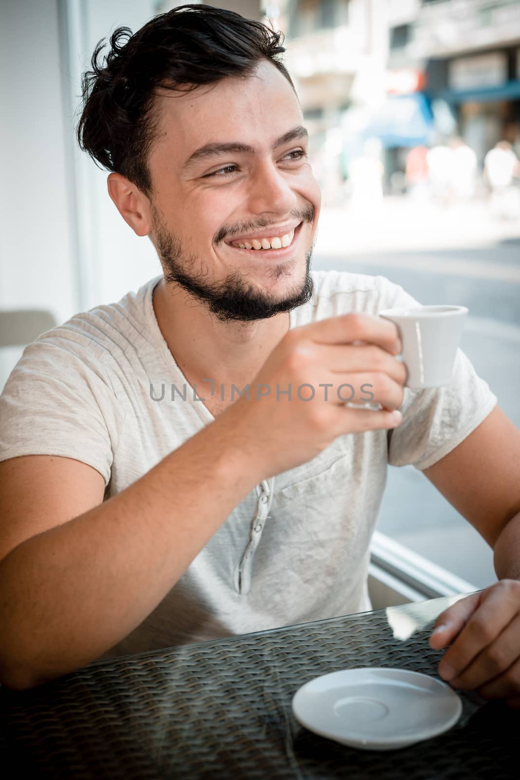 young stylish man in a bar