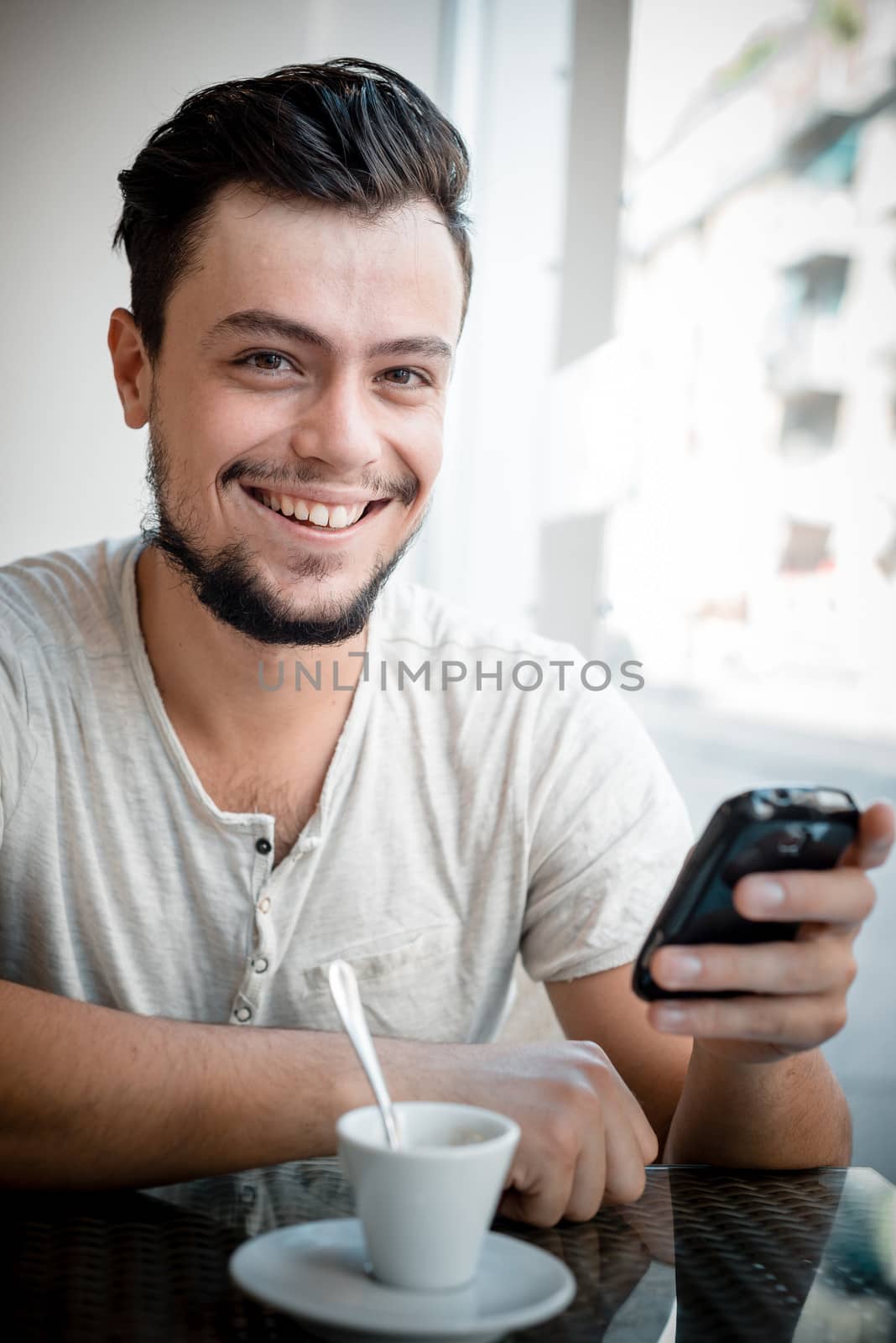 young stylish man in a bar