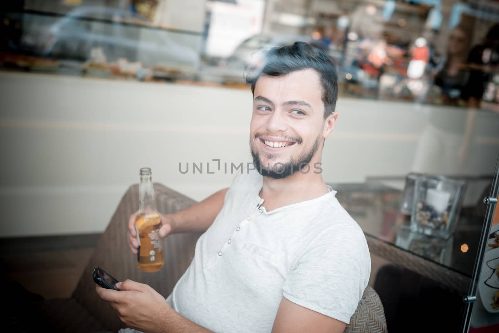 young stylish man in a bar
