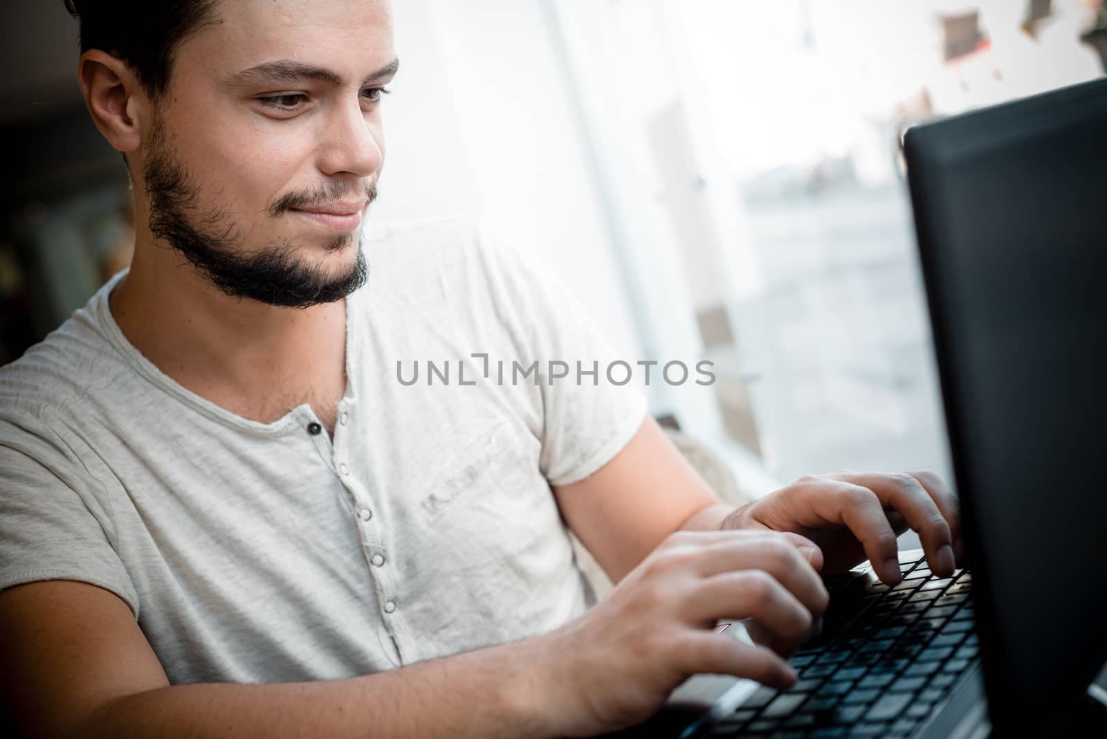 young stylish man in a bar