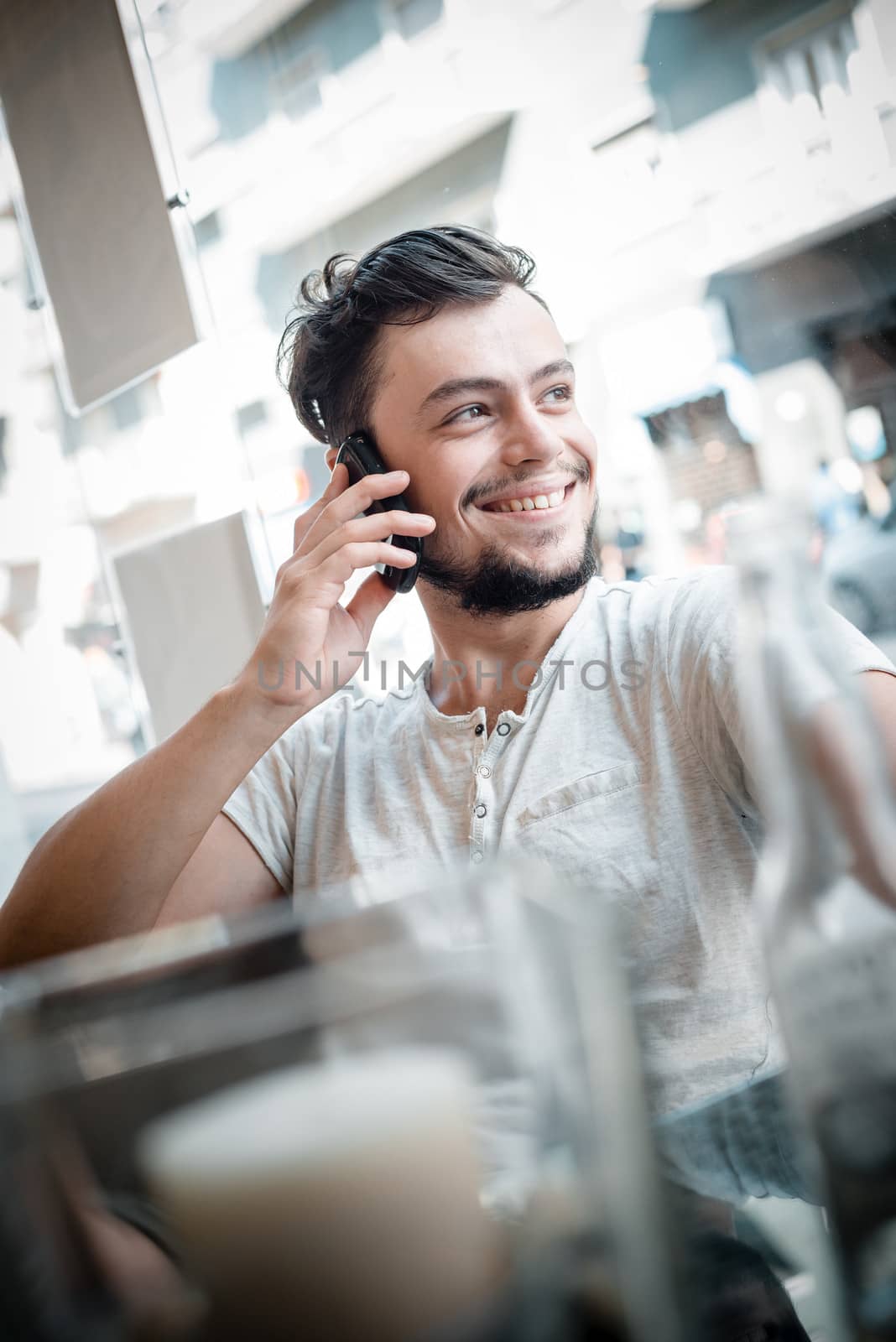 young stylish man in a bar