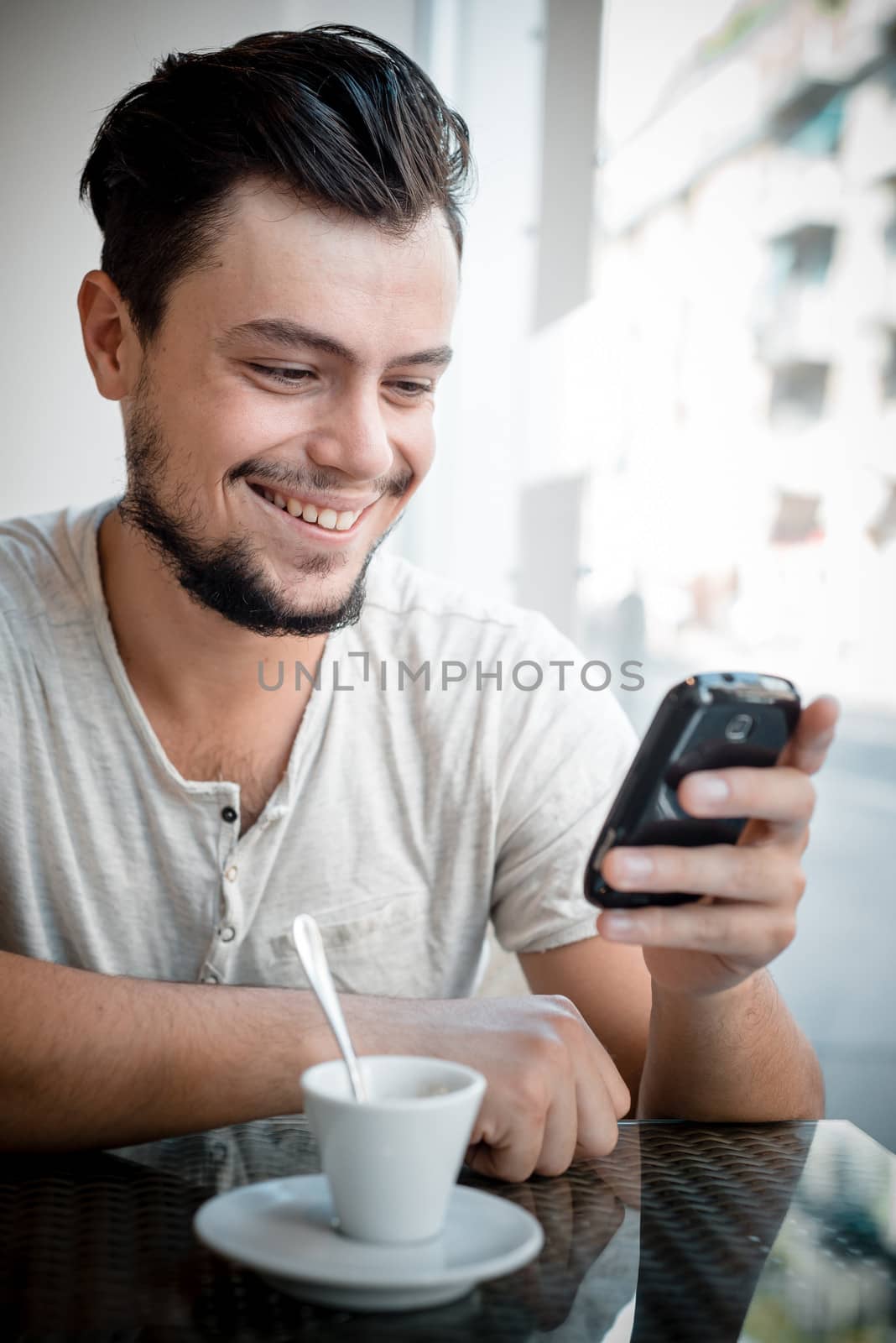 young stylish man in a bar