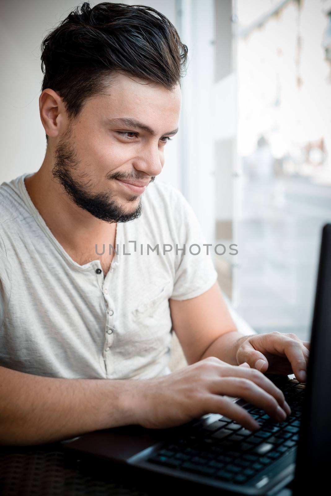 young stylish man in a bar