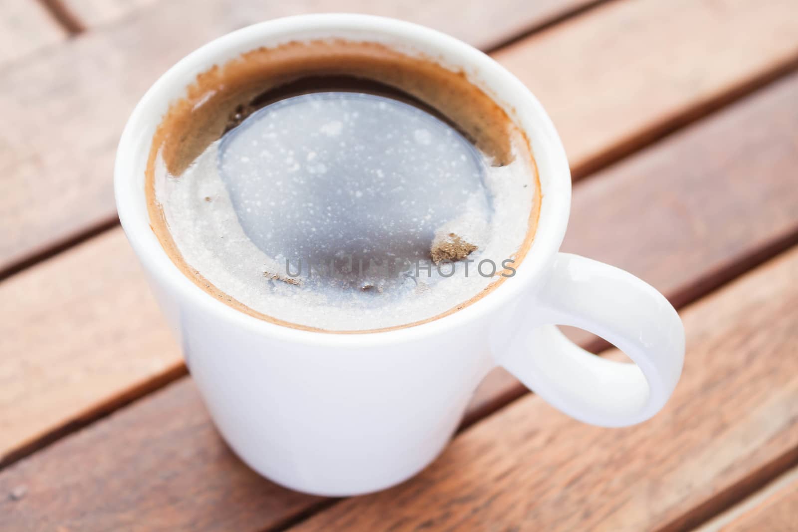 Refreshing drink with a cup of hot espresso