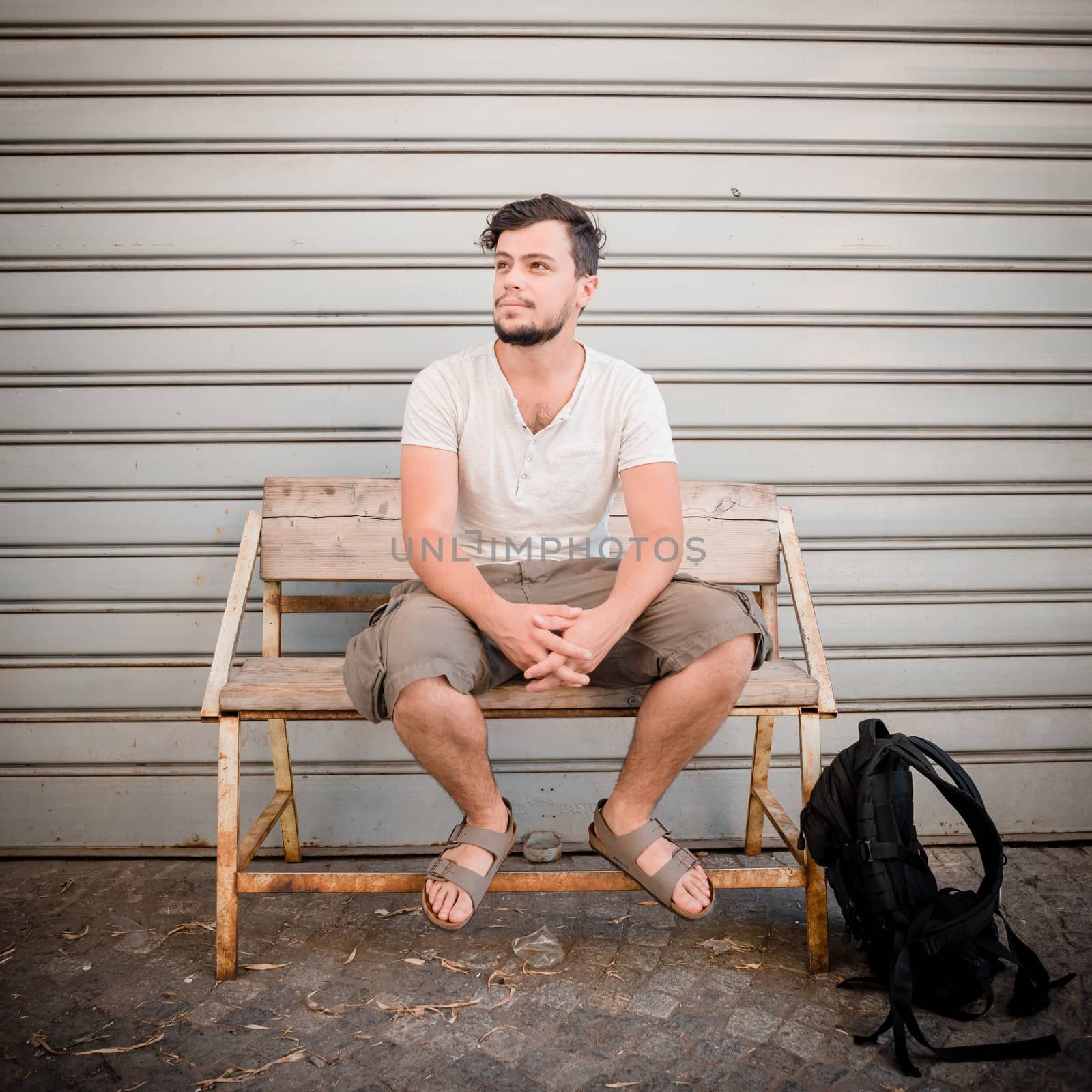 young stylish man in a bar by peus