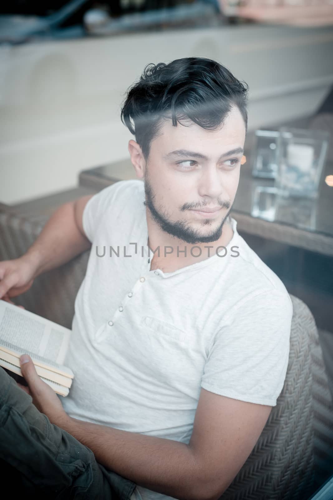 young stylish man in a bar by peus