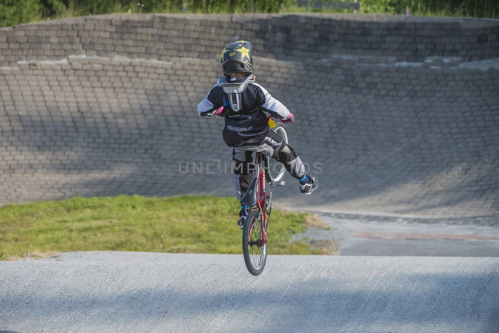 My grandson is an active BMX cyclist, the pictures are shot in Aremark Municipality, Norway where the Bmx track is.